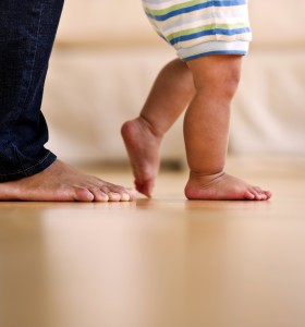 parent and baby feet