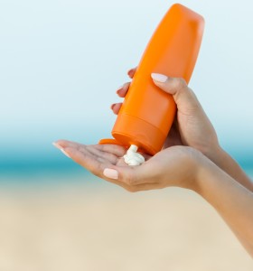 orange bottle of sunscreen