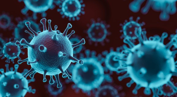 blue coronavirus particles on dark background