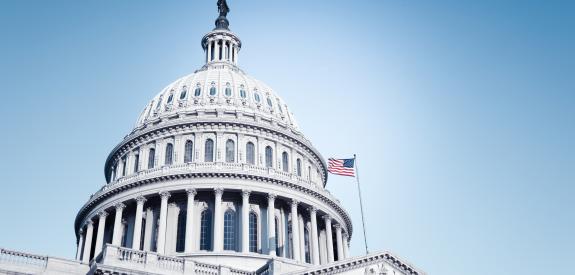 three quarter view of U.S. capitol building from below