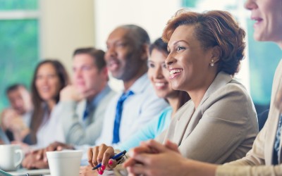 African American Woman and Colleagues in a corporate setting African American Woman and Colleagues in a corporate setting
