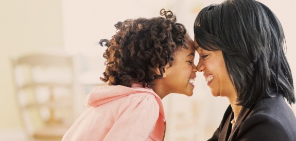 black mother and daughter showing affection