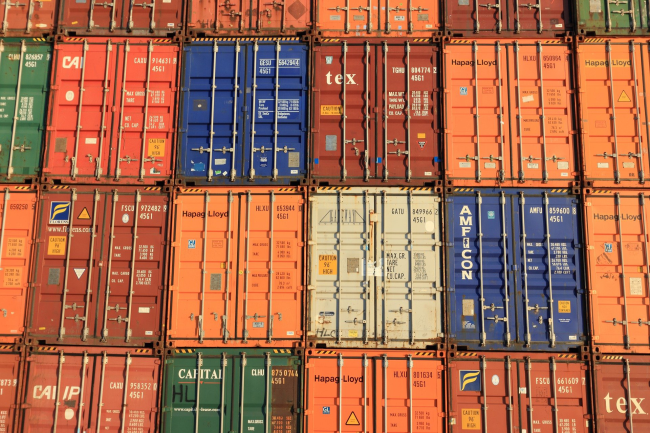blue and orange stacked shipping containers